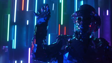 Steel-man-in-a-sparkling-reflective-suit.-Neon-light-Blue-violet-light.-Show-dancer.